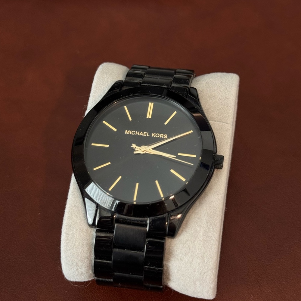 Michael Kors Black and Gold Timepiece